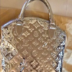 Authentic Louis Vuitton silver monogram mirror bag